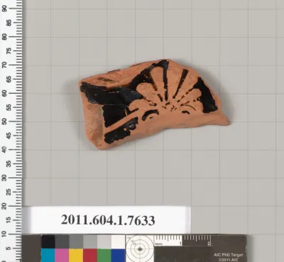 Terracotta fragment of a kylix (drinking cup)