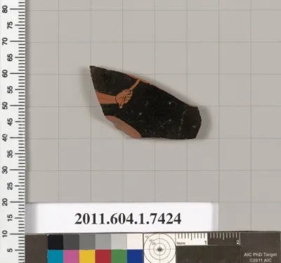 Terracotta fragment of a kylix (drinking cup)