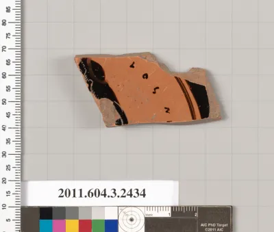 Terracotta fragment of a kylix (drinking cup)