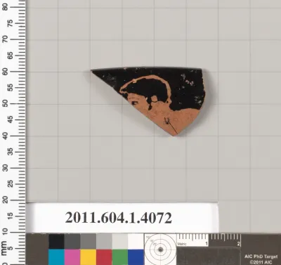 Terracotta rim fragment of a kylix (drinking cup)