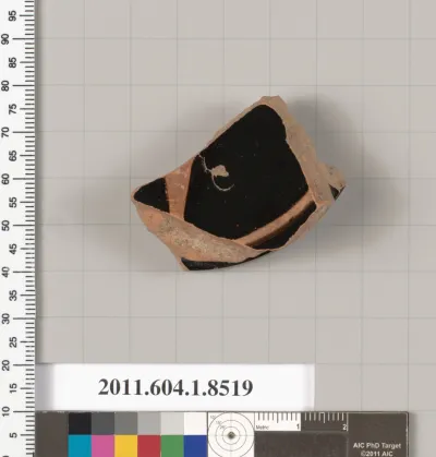 Terracotta fragment of a stemless kylix (drinking cup)