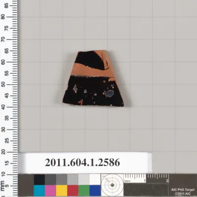 Terracotta fragment of a kylix (drinking cup)