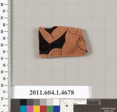 Terracotta fragment of a kylix (drinking cup)