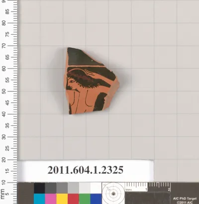 Terracotta fragment of a kylix (drinking cup)