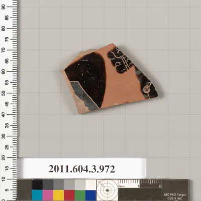 Terracotta fragment of a lekanis lid (covered dish)