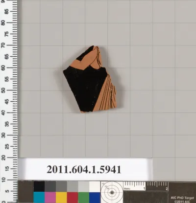 Terracotta fragment of a kylix (drinking cup)