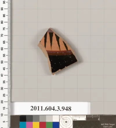 Terracotta fragment of a lekanis lid (covered dish)