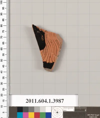 Terracotta fragment of a kylix (drinking cup)