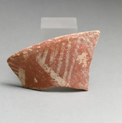 Terracotta rim fragment with linear motifs