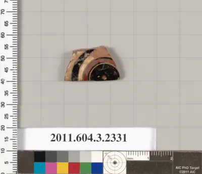 Terracotta fragment of a kylix: eye-cup (drinking cup)