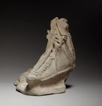 Left foot, possibly from a relief