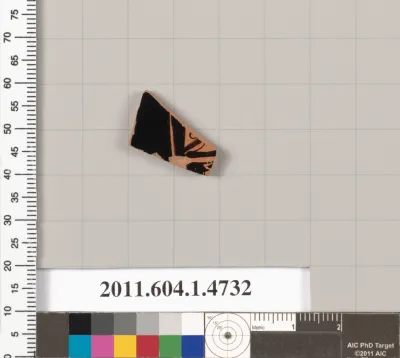 Terracotta fragment of a kylix (drinking cup)