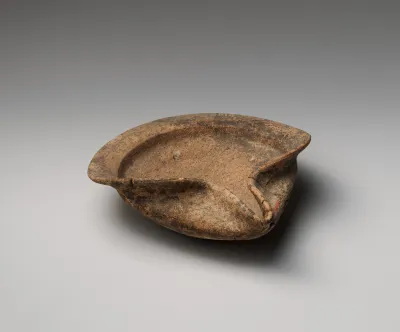Terracotta saucer-shaped lamp