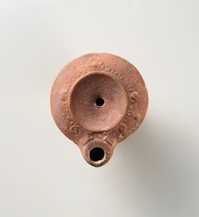 Terracotta oil lamp