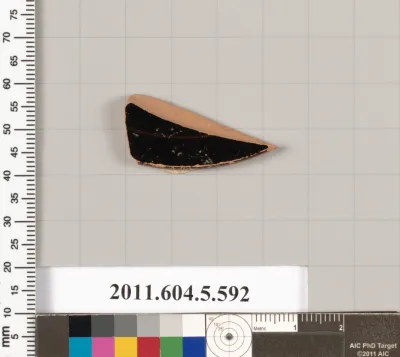 Terracotta fragment of a kylix (drinking cup)