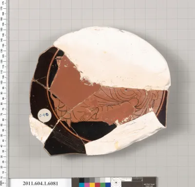 Terracotta fragment of a kylix (drinking cup)