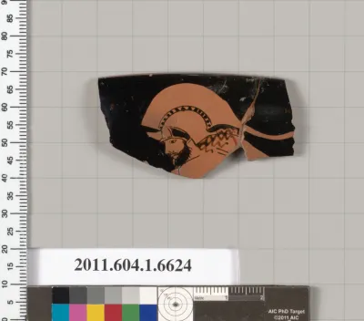 Terracotta rim fragment of a kylix (drinking cup)