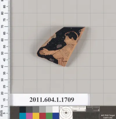 Terracotta rim fragment of a kylix (drinking cup)