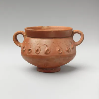 Terracotta cup with barbotine decoration