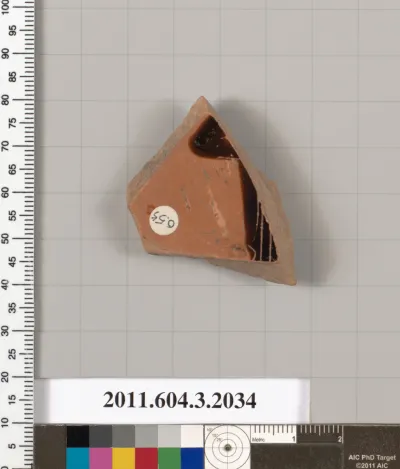 Terracotta fragment of a kylix (drinking cup)