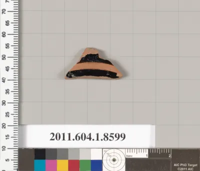 Terracotta fragment of a stemless kylix (drinking cup)