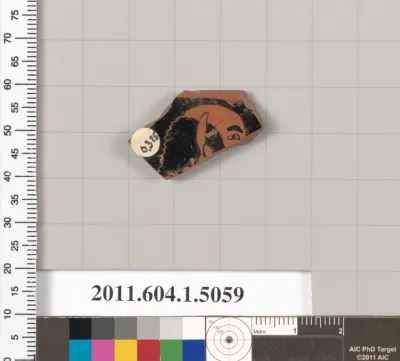 Terracotta fragment of a kylix (drinking cup)