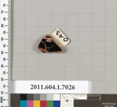 Terracotta rim fragment of a kylix (drinking cup)