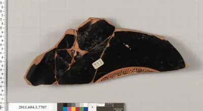 Terracotta fragment of a kylix (drinking cup)