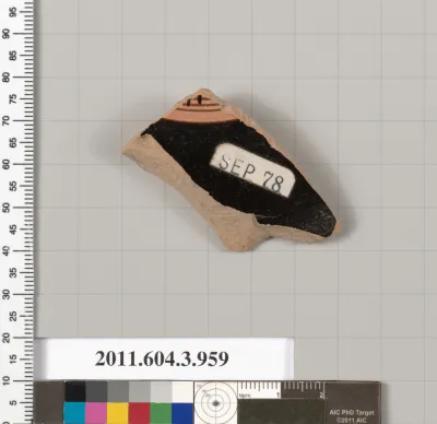 Terracotta fragment of a lekanis lid (covered dish)