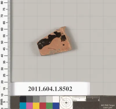 Terracotta fragment of a stemless kylix (drinking cup)