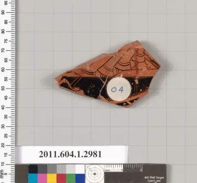 Terracotta fragment of a kylix (drinking cup)