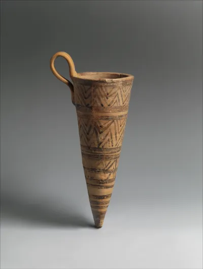 Terracotta conical rhyton (vase for liquid offerings)