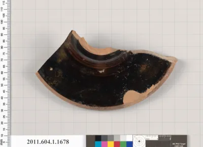 Terracotta fragment of a kylix (drinking cup)