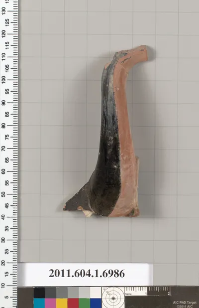 Terracotta fragment of a kylix (drinking cup)