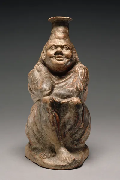 Plastic Vase in the Form of a Seated Enslaved Woman