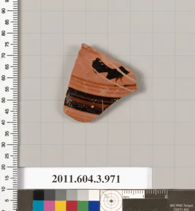 Terracotta fragment of a lekanis lid (covered dish)