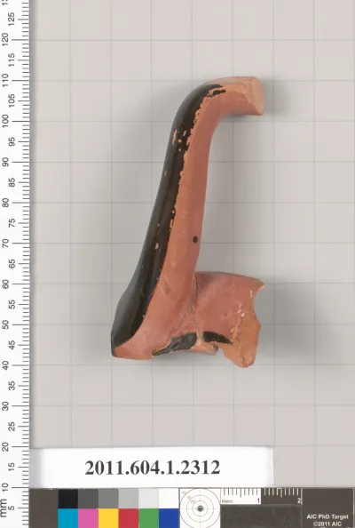 Terracotta fragment of a kylix (drinking cup)