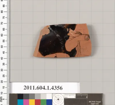 Terracotta fragment of a kylix (drinking cup)