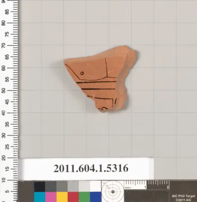 Terracotta fragment of a kylix (drinking cup)