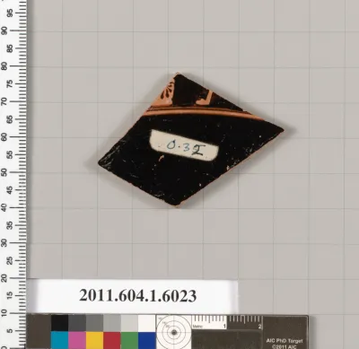 Terracotta fragment of a kylix (drinking cup)