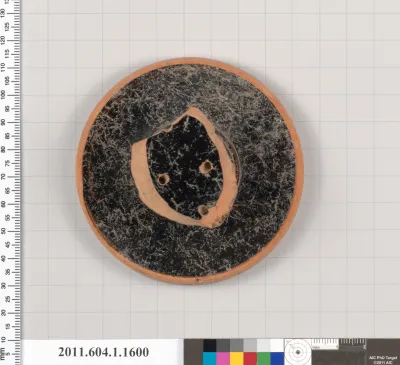 Terracotta fragment of a kylix (drinking cup)