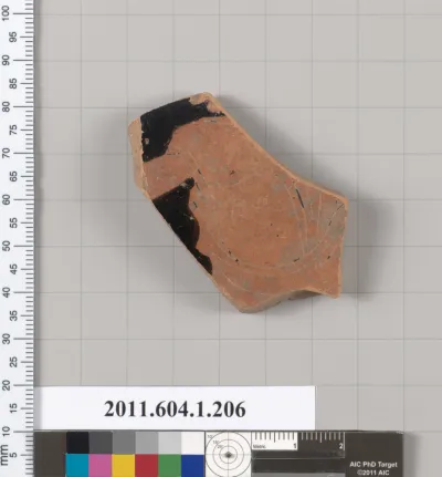 Terracotta fragment of a kylix (drinking cup)