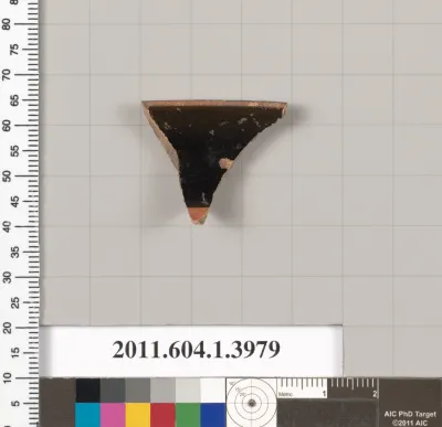 Terracotta rim fragment of a kylix (drinking cup)