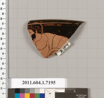 Terracotta rim fragment of a kylix (drinking cup)