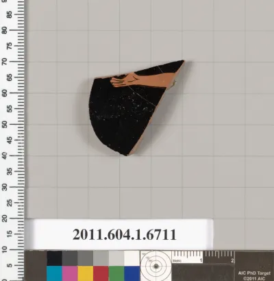 Terracotta fragment of a kylix (drinking cup)