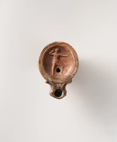 Terracotta oil lamp