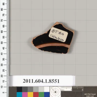 Terracotta fragment of a stemless kylix (drinking cup)