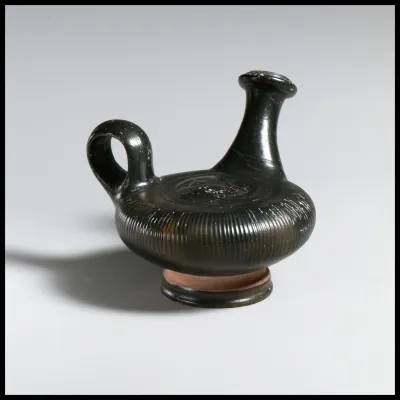 Terracotta guttus (flask with handle and vertical spout)