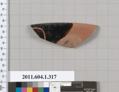 Terracotta rim fragment of a kylix (drinking cup)