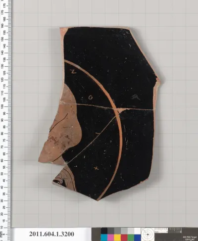 Terracotta fragment of a kylix (drinking cup)